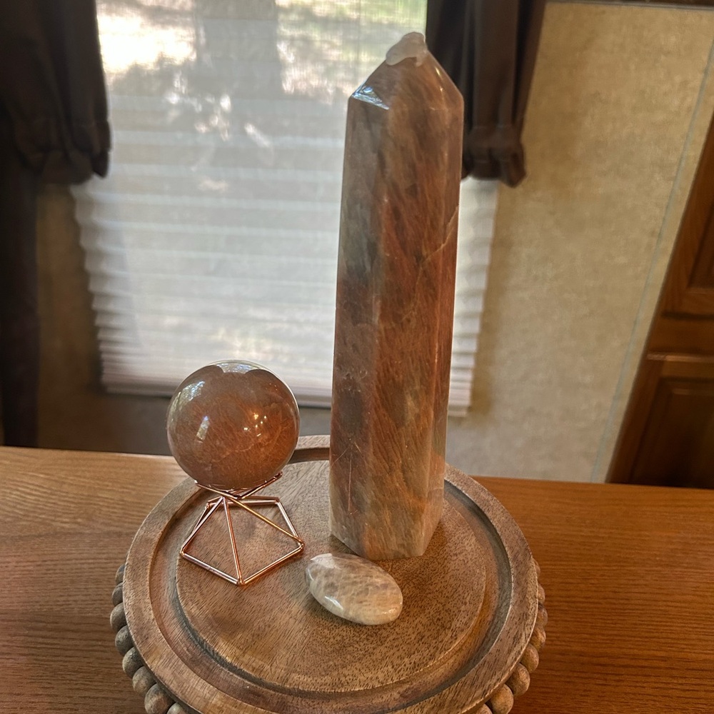 Beautiful Peach Moonstone obelisk, sphere with stand and palm stone.